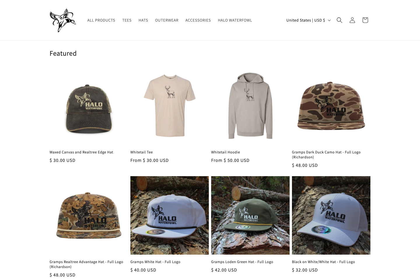 The reopened HALO Waterfowl storefront on launch day, a clean featured grid of hats, tees, and hoodies